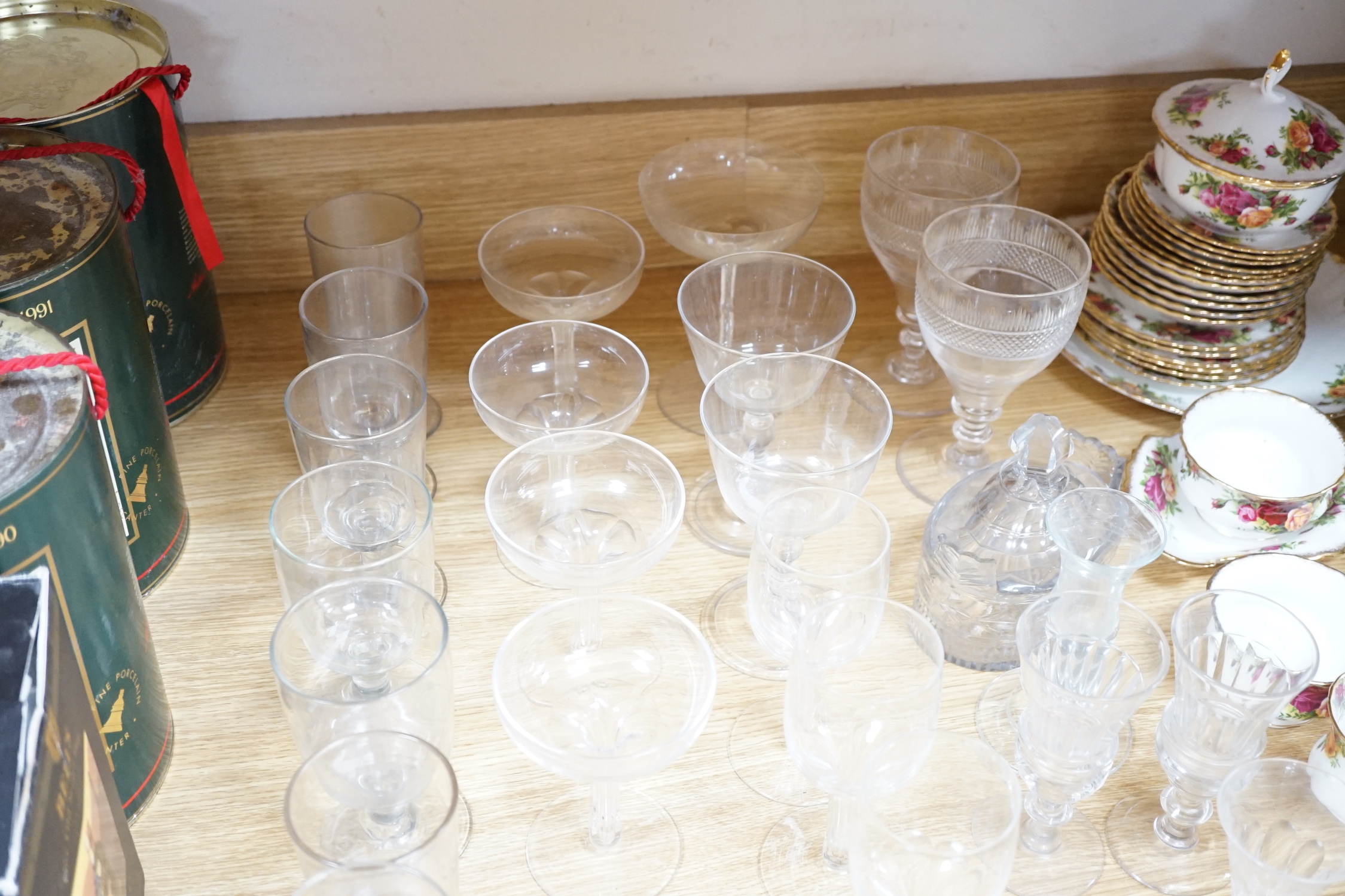 A group of 19th century and later glasses and a George III glass butter tub and cover